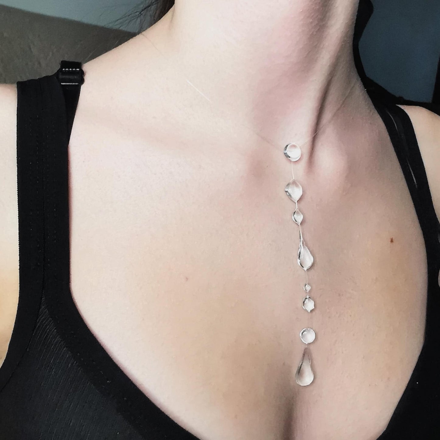 Delicate Negligee necklace with clear crystal droplets on an invisible thread, resembling morning dew